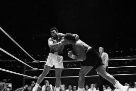 Buster_Mathis_Punching_Muhammad_Ali.jpg