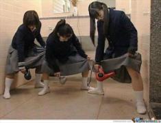 meanwhile-in-japan-girls-blow-drying-their-dresses-300x230.jpg