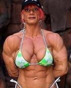muscular-women-stone-wall.jpg