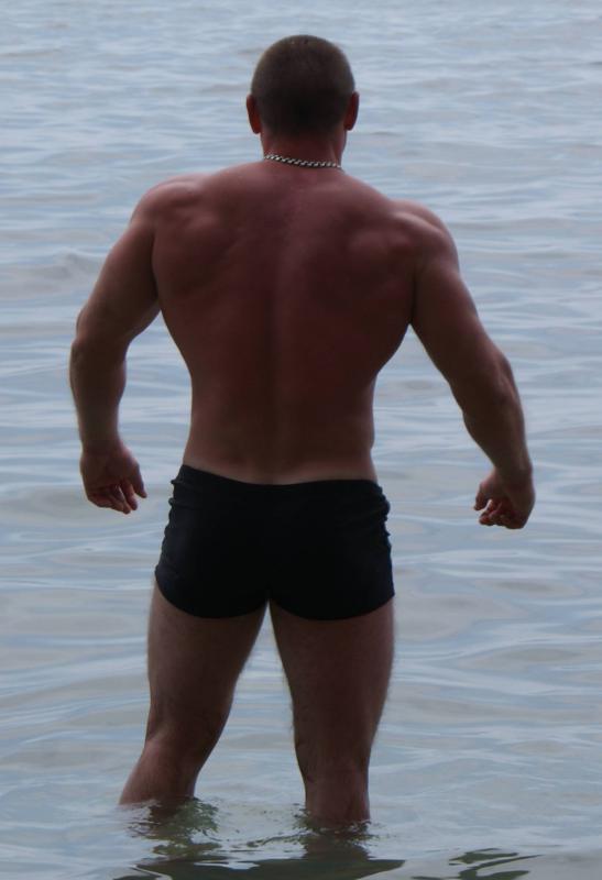 Боль в шее после жима стоя